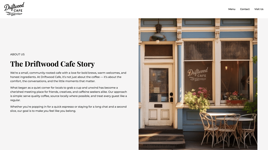 Charming blue and cream storefront of Driftwood Cafe with outdoor seating and flower boxes.